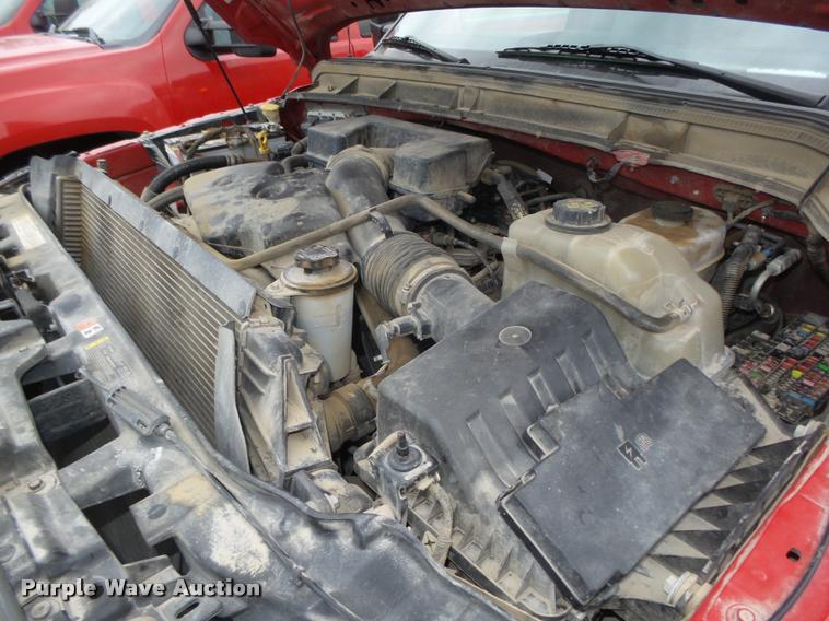 image for item DA0651 2012 Ford F350 Super Duty XL Crew Cab flatbed pickup truck