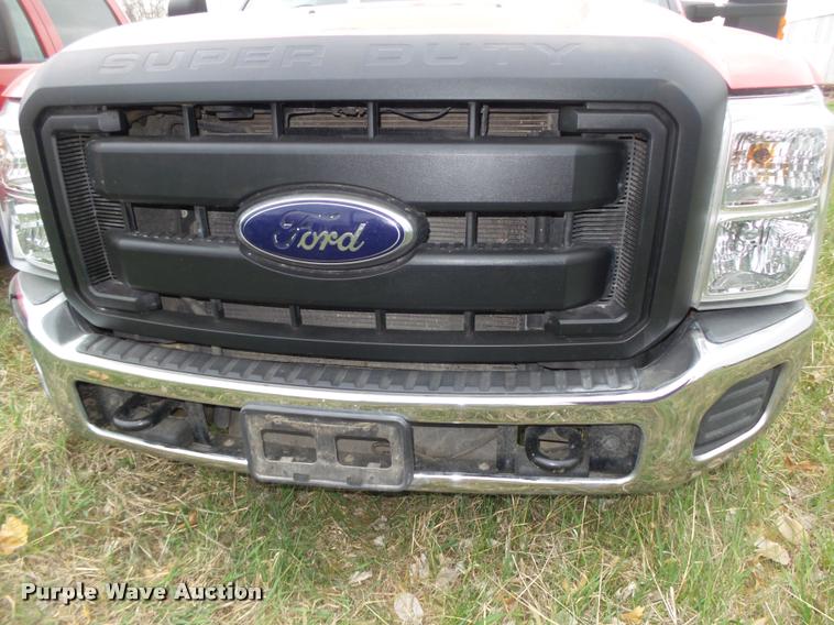 image for item DA0651 2012 Ford F350 Super Duty XL Crew Cab flatbed pickup truck