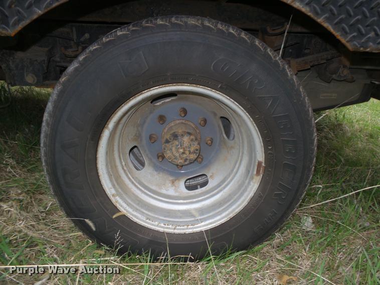 image for item DA0651 2012 Ford F350 Super Duty XL Crew Cab flatbed pickup truck