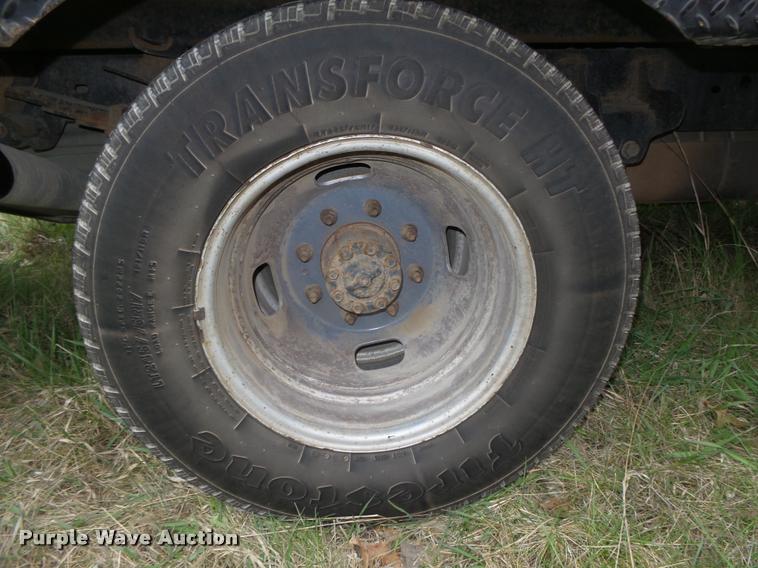 image for item DA0651 2012 Ford F350 Super Duty XL Crew Cab flatbed pickup truck