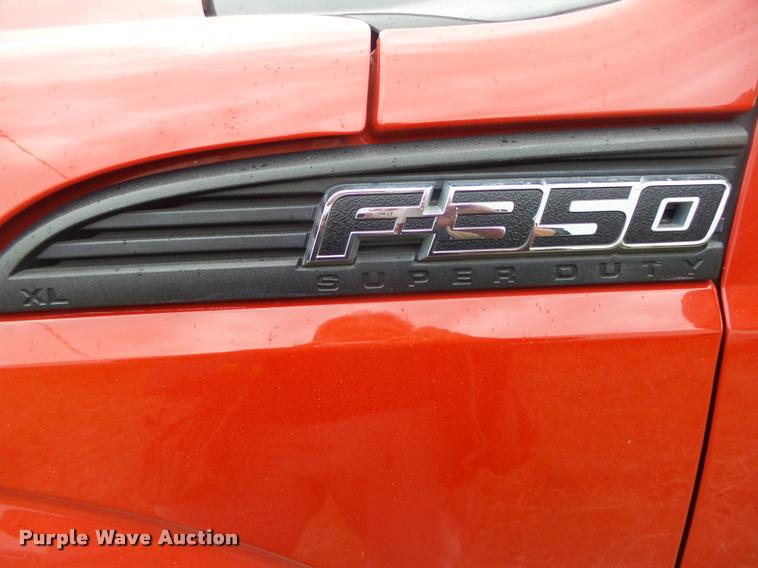 image for item DA0651 2012 Ford F350 Super Duty XL Crew Cab flatbed pickup truck