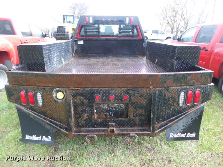image for item DA0654 2012 Ford F350 Super Duty XL Crew Cab flatbed pickup truck