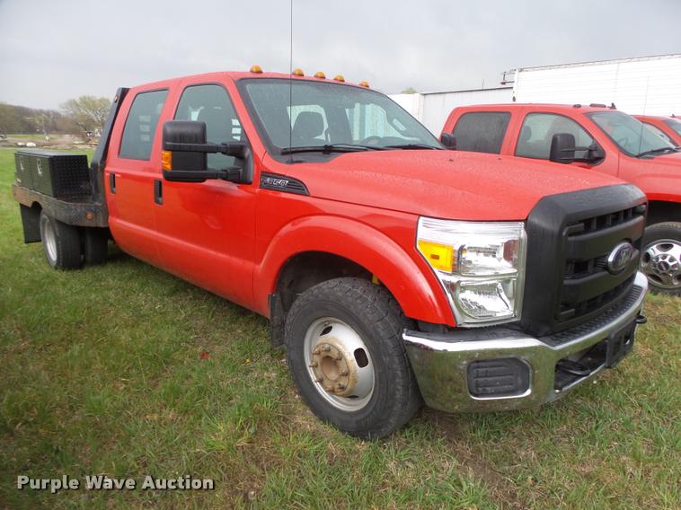 image for item DA0654 2012 Ford F350 Super Duty XL Crew Cab flatbed pickup truck