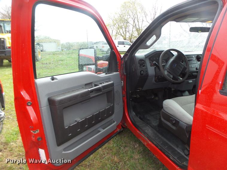 image for item DA0654 2012 Ford F350 Super Duty XL Crew Cab flatbed pickup truck