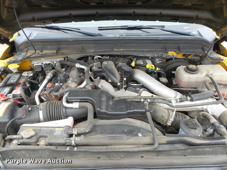 image for item DB1998 2012 Ford F350 Super Duty Crew Cab flatbed pickup truck