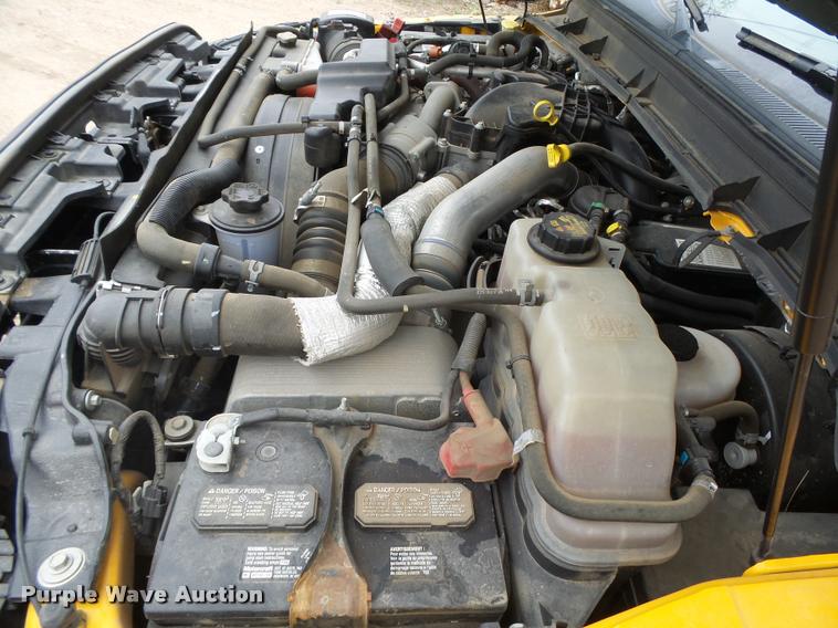 image for item DB1998 2012 Ford F350 Super Duty Crew Cab flatbed pickup truck