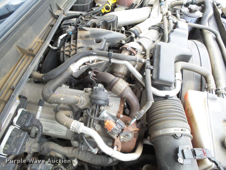 image for item DB1998 2012 Ford F350 Super Duty Crew Cab flatbed pickup truck