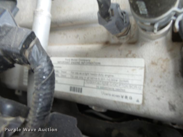 image for item DB1998 2012 Ford F350 Super Duty Crew Cab flatbed pickup truck