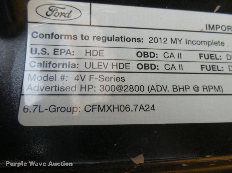 image for item DB1998 2012 Ford F350 Super Duty Crew Cab flatbed pickup truck