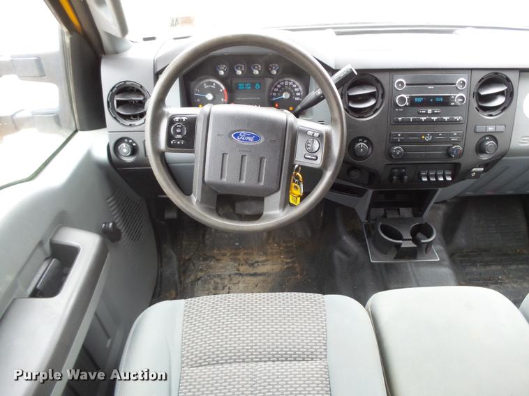 image for item DB1998 2012 Ford F350 Super Duty Crew Cab flatbed pickup truck