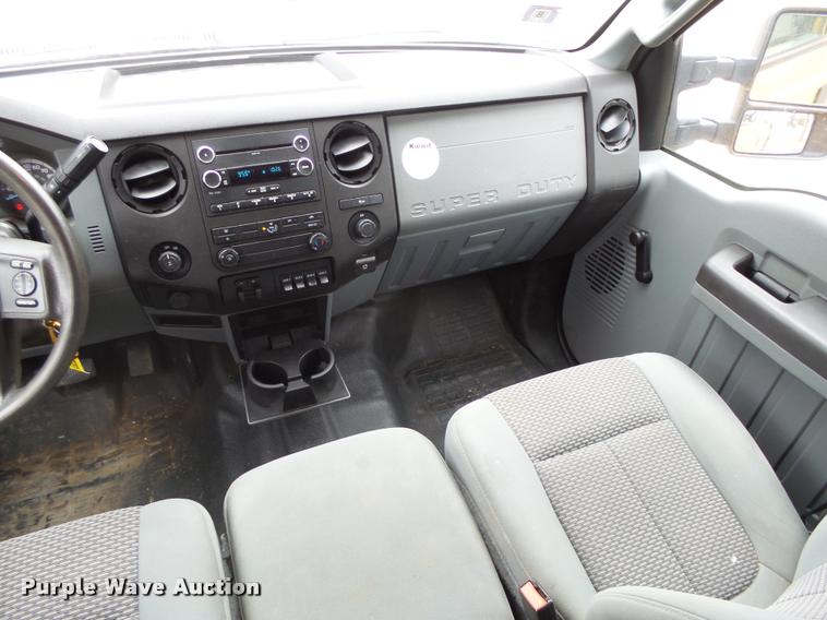 image for item DB1998 2012 Ford F350 Super Duty Crew Cab flatbed pickup truck