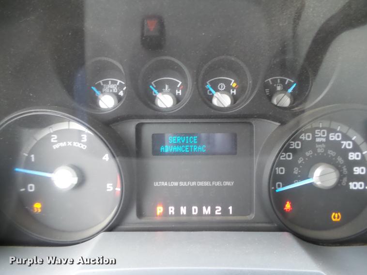 image for item DB1998 2012 Ford F350 Super Duty Crew Cab flatbed pickup truck