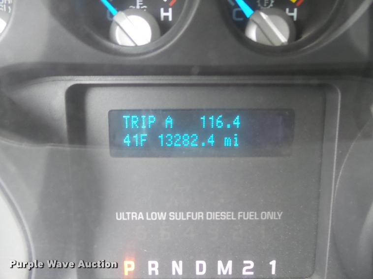 image for item DB1998 2012 Ford F350 Super Duty Crew Cab flatbed pickup truck