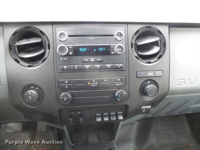 image for item DB1998 2012 Ford F350 Super Duty Crew Cab flatbed pickup truck