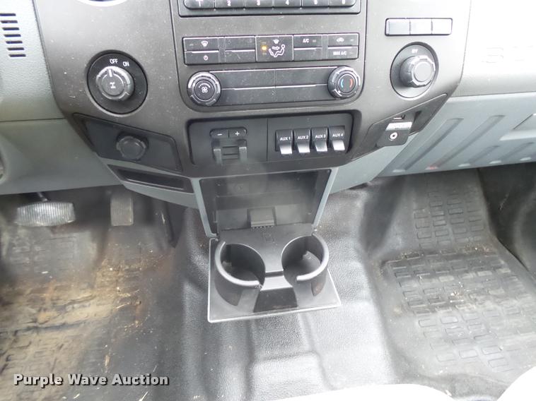 image for item DB1998 2012 Ford F350 Super Duty Crew Cab flatbed pickup truck