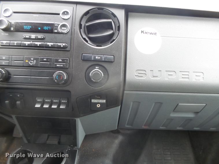 image for item DB1998 2012 Ford F350 Super Duty Crew Cab flatbed pickup truck