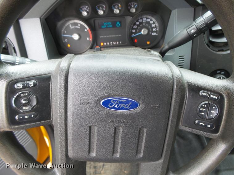 image for item DB1998 2012 Ford F350 Super Duty Crew Cab flatbed pickup truck