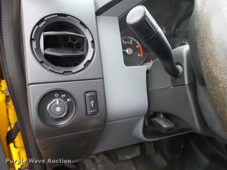 image for item DB1998 2012 Ford F350 Super Duty Crew Cab flatbed pickup truck