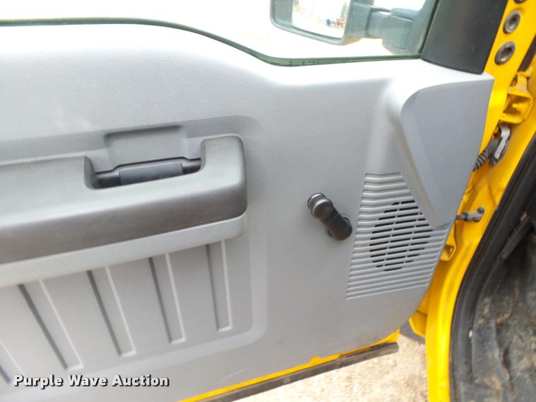 image for item DB1998 2012 Ford F350 Super Duty Crew Cab flatbed pickup truck