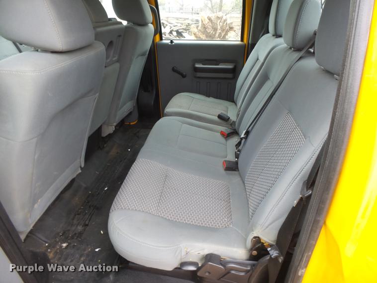 image for item DB1998 2012 Ford F350 Super Duty Crew Cab flatbed pickup truck