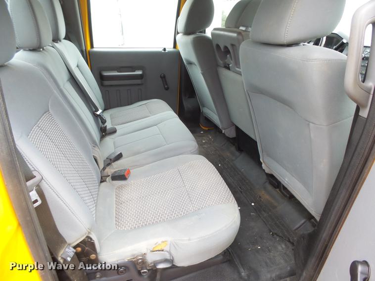 image for item DB1998 2012 Ford F350 Super Duty Crew Cab flatbed pickup truck