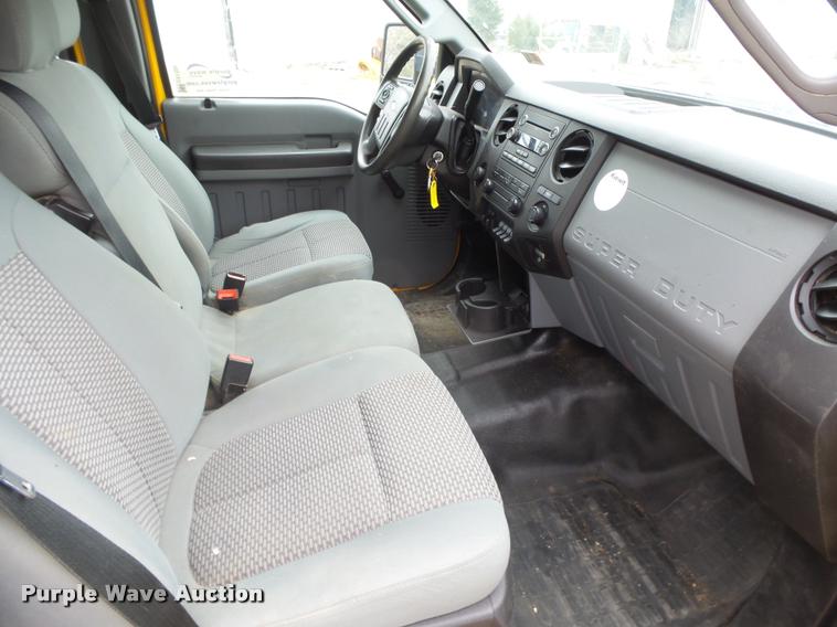 image for item DB1998 2012 Ford F350 Super Duty Crew Cab flatbed pickup truck