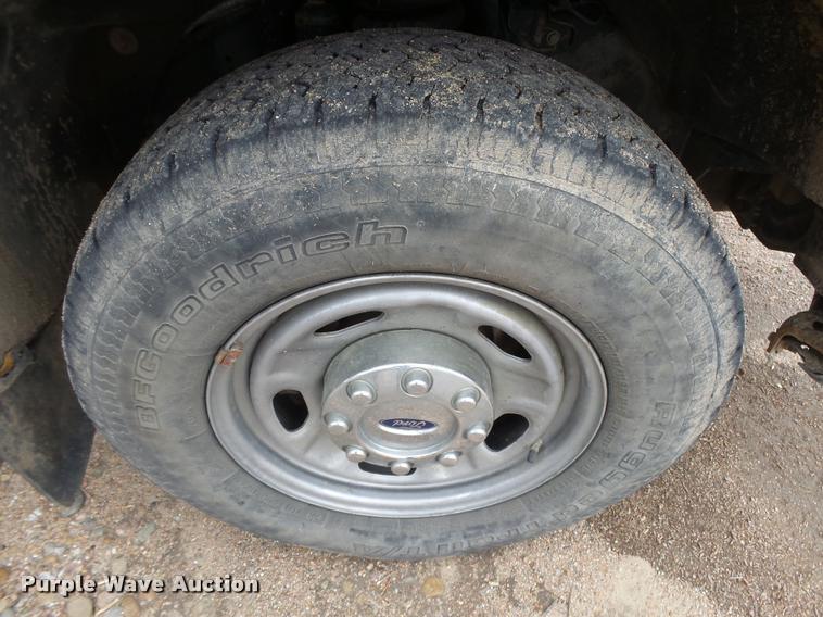 image for item DB1998 2012 Ford F350 Super Duty Crew Cab flatbed pickup truck