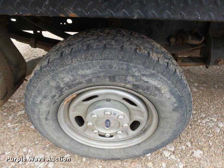 image for item DB1998 2012 Ford F350 Super Duty Crew Cab flatbed pickup truck