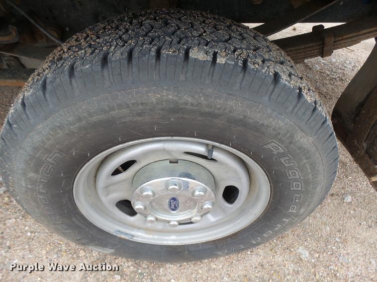 image for item DB1998 2012 Ford F350 Super Duty Crew Cab flatbed pickup truck