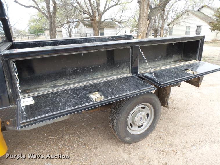 image for item DB1998 2012 Ford F350 Super Duty Crew Cab flatbed pickup truck