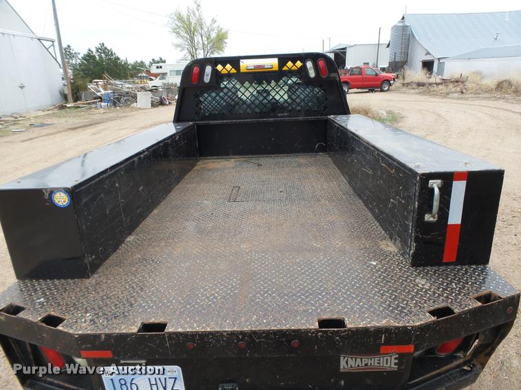 image for item DB1998 2012 Ford F350 Super Duty Crew Cab flatbed pickup truck