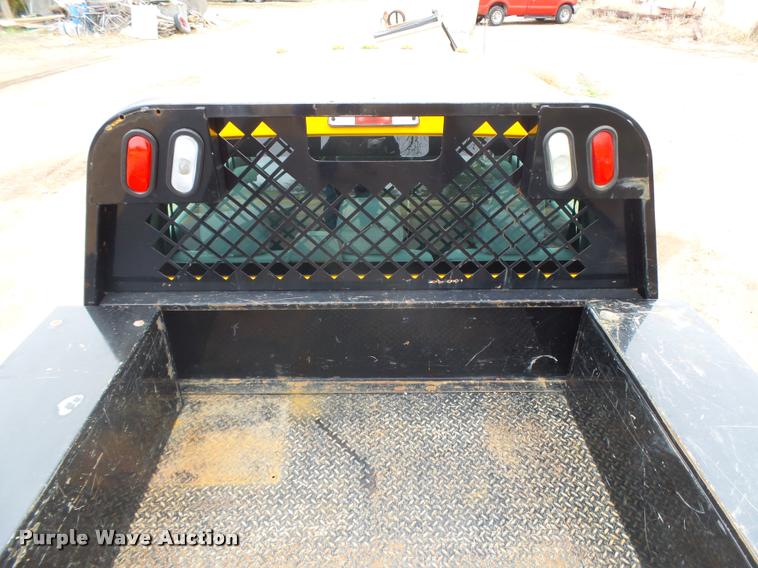image for item DB1998 2012 Ford F350 Super Duty Crew Cab flatbed pickup truck