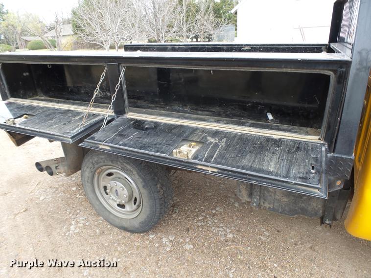 image for item DB1998 2012 Ford F350 Super Duty Crew Cab flatbed pickup truck