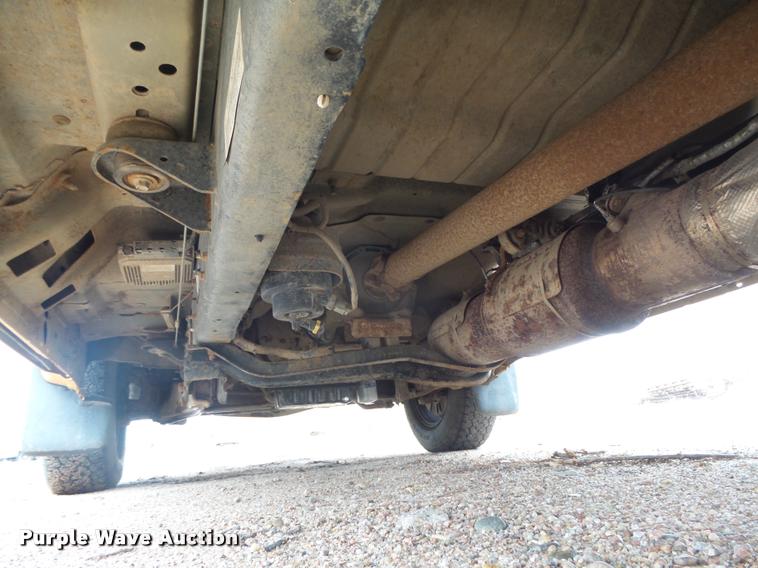 image for item DB1998 2012 Ford F350 Super Duty Crew Cab flatbed pickup truck