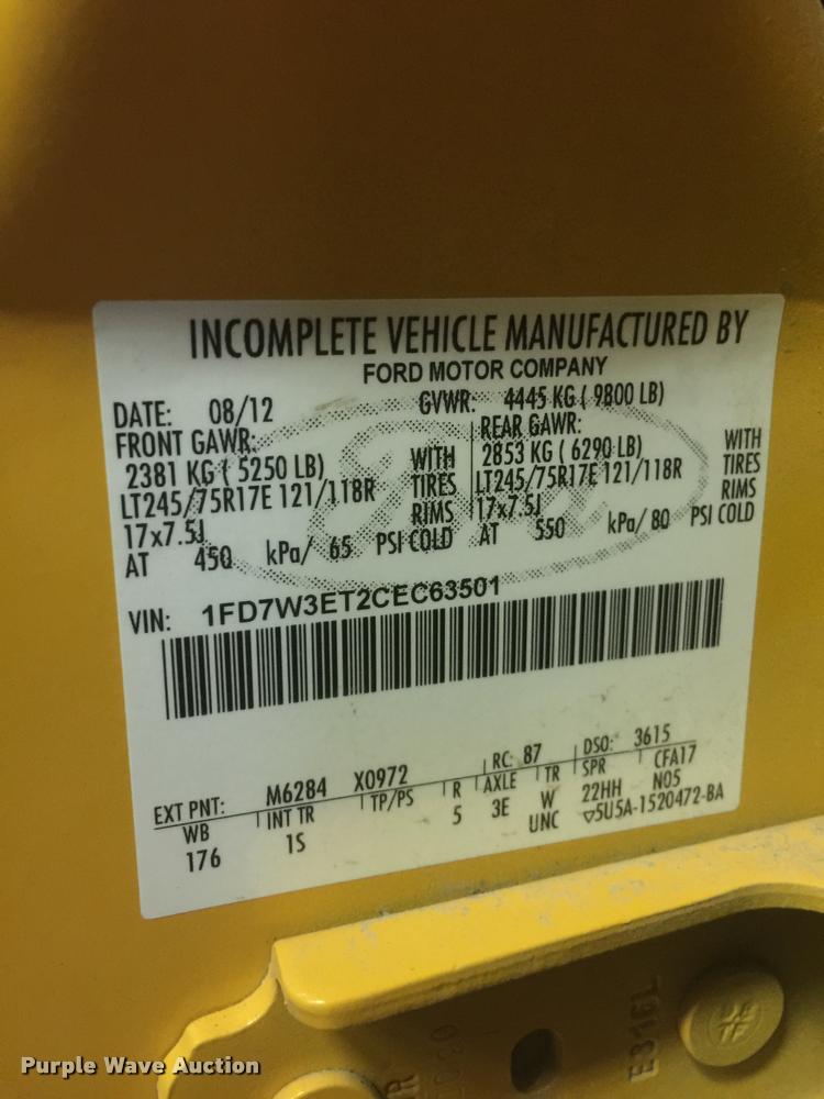 image for item DB1998 2012 Ford F350 Super Duty Crew Cab flatbed pickup truck