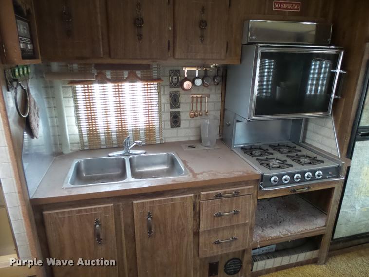 image for item DB1999 1977 Ford Holiday Rambler RV