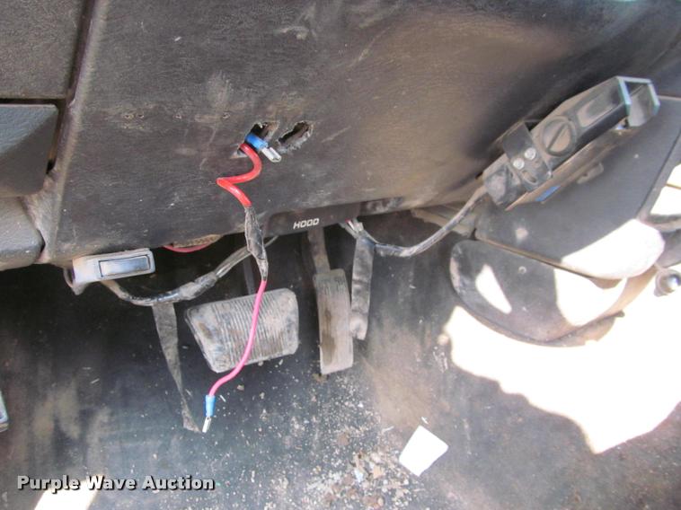 image for item J2597 2005 Dodge Ram 2500 Quad Cab flatbed pickup truck