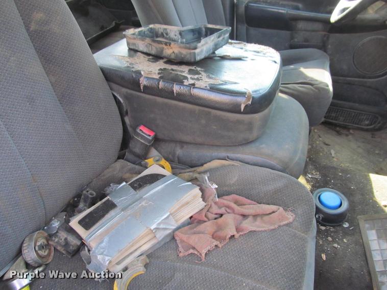 image for item J2597 2005 Dodge Ram 2500 Quad Cab flatbed pickup truck