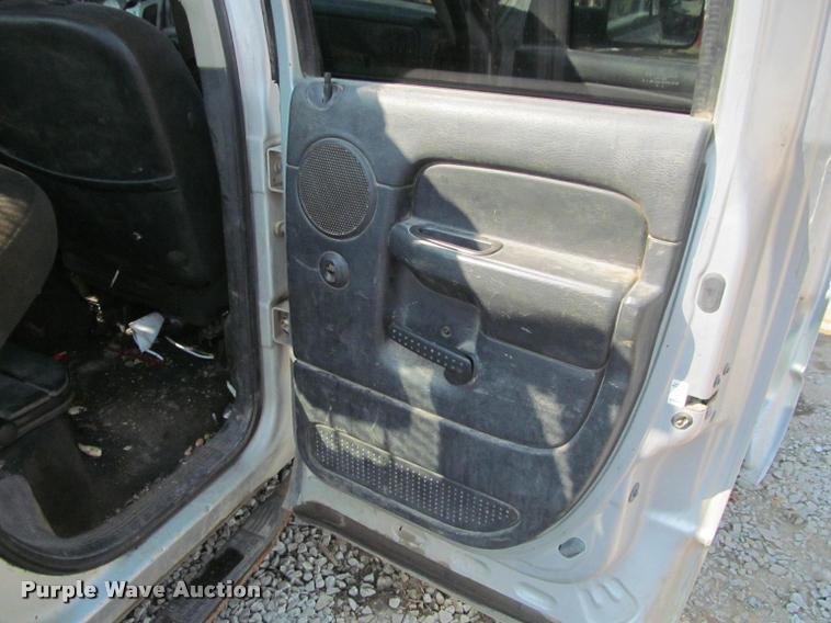 image for item J2597 2005 Dodge Ram 2500 Quad Cab flatbed pickup truck