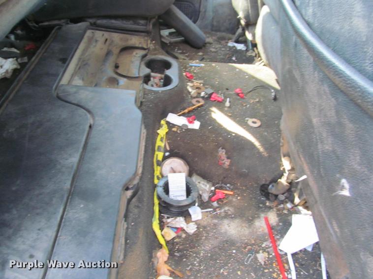 image for item J2597 2005 Dodge Ram 2500 Quad Cab flatbed pickup truck