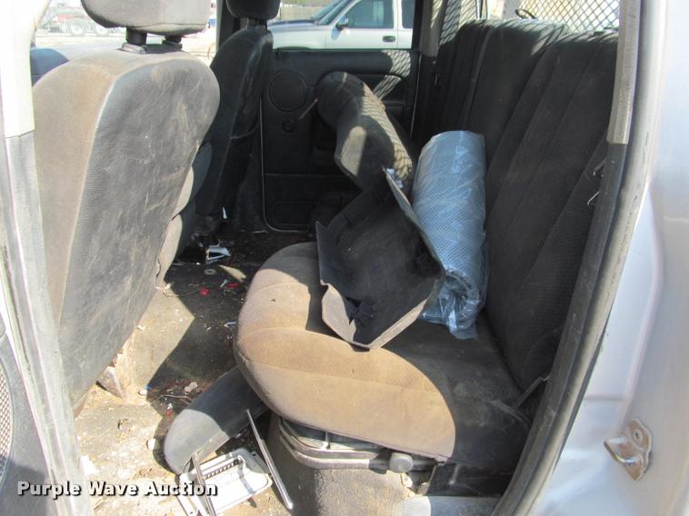 image for item J2597 2005 Dodge Ram 2500 Quad Cab flatbed pickup truck