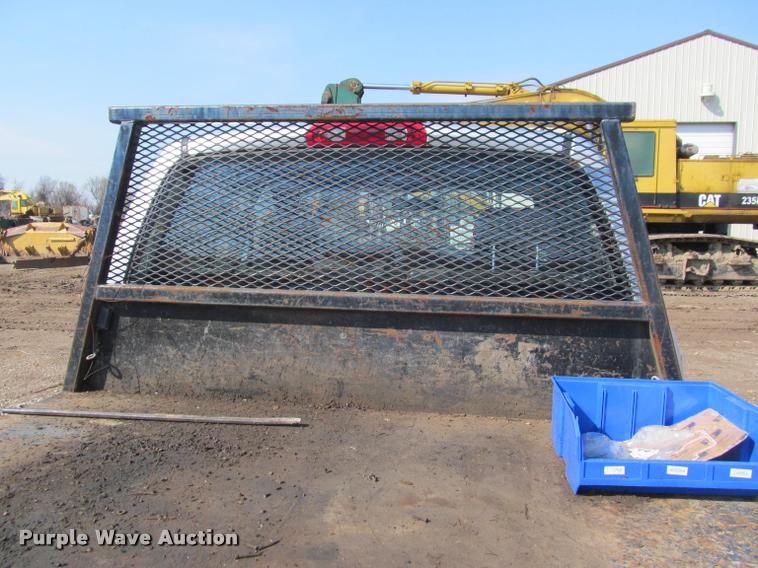 image for item J2597 2005 Dodge Ram 2500 Quad Cab flatbed pickup truck