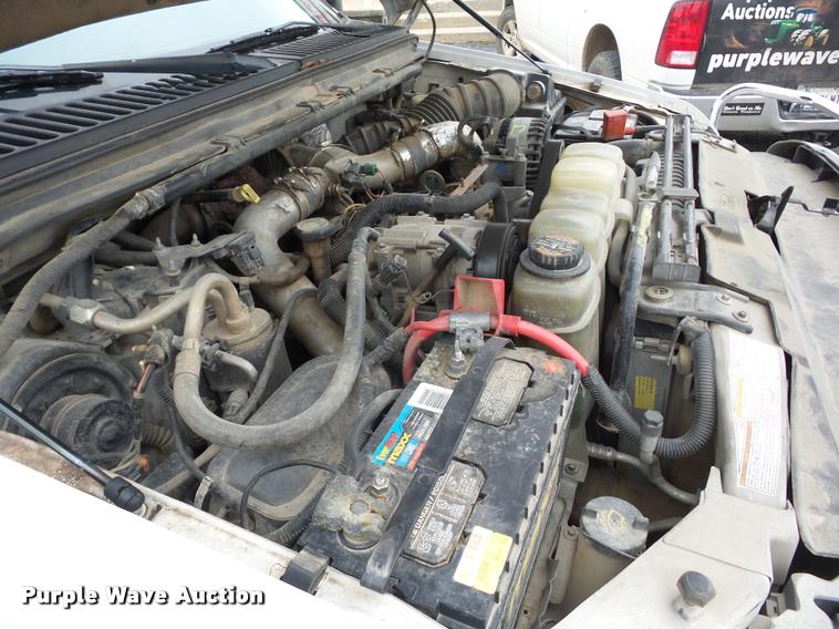 image for item J8655 2000 Ford F350 Super Duty SuperCab flatbed pickup truck