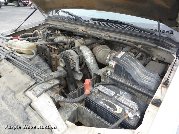 image for item J8655 2000 Ford F350 Super Duty SuperCab flatbed pickup truck