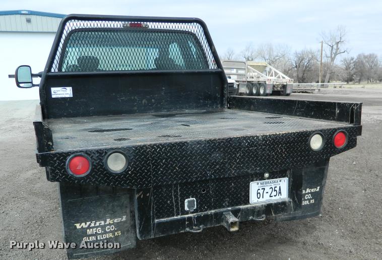 image for item K2681 2005 Ford F250 Super Duty SuperCab flatbed pickup truck