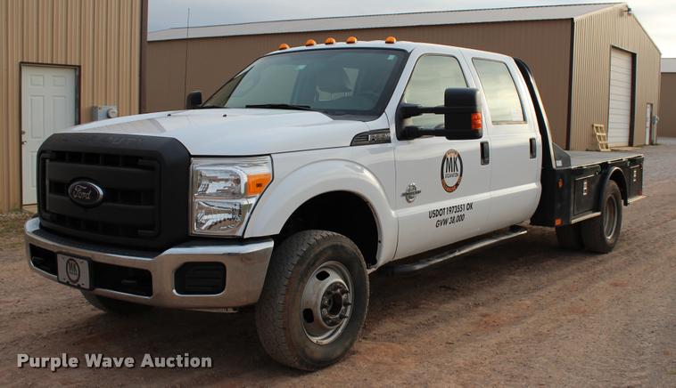 image for item L4956 2014 Ford F350 Super Duty CrewCab flatbed pickup truck