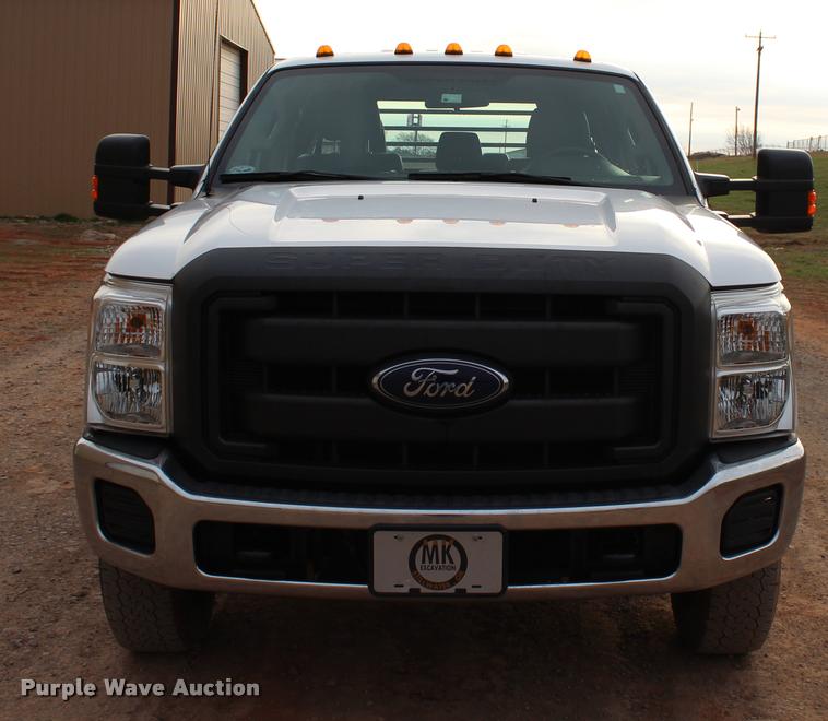 image for item L4956 2014 Ford F350 Super Duty CrewCab flatbed pickup truck