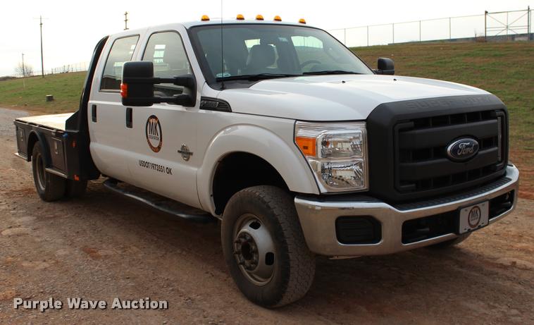image for item L4956 2014 Ford F350 Super Duty CrewCab flatbed pickup truck