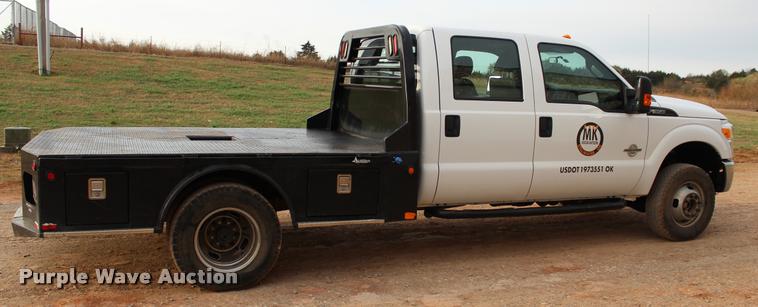 image for item L4956 2014 Ford F350 Super Duty CrewCab flatbed pickup truck