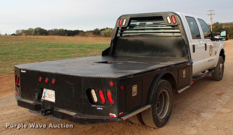 image for item L4956 2014 Ford F350 Super Duty CrewCab flatbed pickup truck